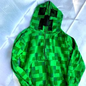 Well loved minecraft creeper hoodie with full face hood.  Size S (kids size 7/8)